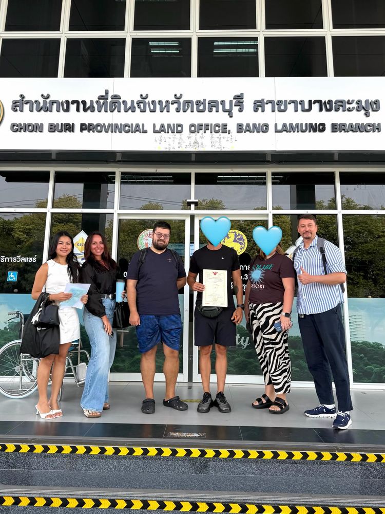 Fiona and clients completing a property transfer at Bang Lamung Land Office